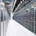 A modern mining farm showcasing a plethora of mining rigs with impressive cooling systems