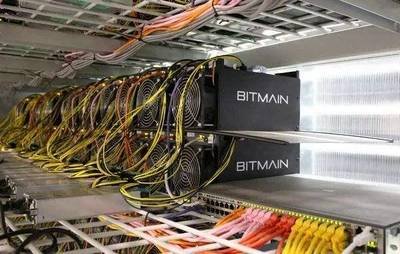 An overview of a mining farm with multiple rigs in operation